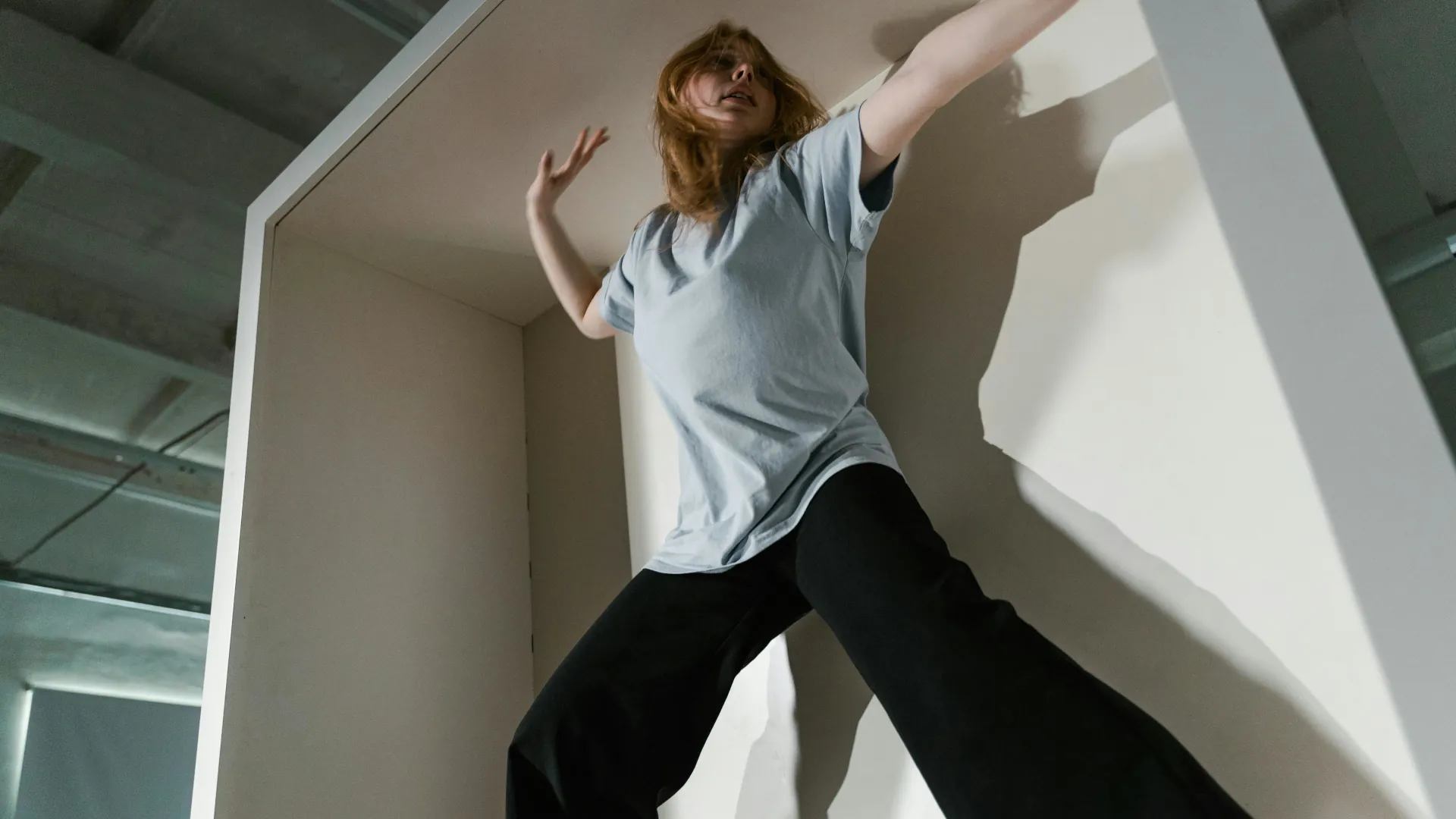 Young woman who is suffering with claustrophobia.